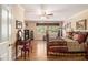 Cozy bedroom featuring a four-poster bed, hardwood floors, and natural light at 4855 Regency Sw Trce, Atlanta, GA 30331