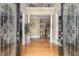 A grand entryway with hardwood floors, decorative doors, and views of the home's interior at 4855 Regency Sw Trce, Atlanta, GA 30331
