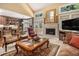 Cozy living room featuring a fireplace, elegant decor, and an open layout at 4855 Regency Sw Trce, Atlanta, GA 30331