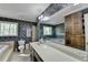 Bathroom features a tub, shower, blue wallpaper and a large white countertop at 5800 S Richland Creek Rd, Buford, GA 30518
