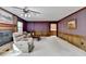 Cozy living room with fireplace, comfortable seating, and natural light at 5800 S Richland Creek Rd, Buford, GA 30518