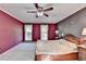 Main bedroom features plush carpeting, large windows, and ornate decor at 5800 S Richland Creek Rd, Buford, GA 30518