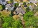 Overhead shot of a backyard featuring a private yard and mature trees surrounding the property at 6565 Scottsfield Trce, Cumming, GA 30028