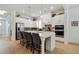 Well-designed kitchen with stainless steel appliances, white cabinetry, a large island, and a breakfast bar at 763 Arrendale Dr, Marietta, GA 30064