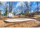 Backyard features a basketball court and storage shed at 932 Mount Airy Sw Dr, Atlanta, GA 30311