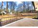 View of a well-maintained backyard with a patio and mature trees at 932 Mount Airy Sw Dr, Atlanta, GA 30311