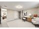 Finished basement area with an office, neutral tones, and an en suite bathroom at 932 Mount Airy Sw Dr, Atlanta, GA 30311