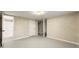 Spacious basement area with neutral walls and paint, adjacent bathroom, and lots of storage possibilities at 932 Mount Airy Sw Dr, Atlanta, GA 30311