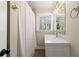 Stylish bathroom featuring a modern vanity, new fixtures and a shower/tub combo for comfort and convenience at 932 Mount Airy Sw Dr, Atlanta, GA 30311