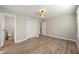 Spacious bedroom with light-colored walls, modern ceiling fixture, and large closet for optimal storage at 932 Mount Airy Sw Dr, Atlanta, GA 30311