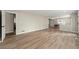 Open concept living room featuring a dining area with hard wood flooring at 932 Mount Airy Sw Dr, Atlanta, GA 30311