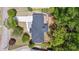 Stunning aerial view of the house showcasing the roof and surrounding lush landscaping and driveway at 2327 Doreen Ne Ct, Atlanta, GA 30345