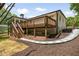 Backyard featuring a wooden deck with stairs and a landscaped yard at 2327 Doreen Ne Ct, Atlanta, GA 30345