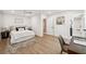 Spacious bedroom with clean lines, neutral colors, ceiling fan and modern decor at 2327 Doreen Ne Ct, Atlanta, GA 30345
