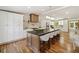 Bright kitchen with a large island and breakfast bar, providing ample counter space and seating at 2327 Doreen Ne Ct, Atlanta, GA 30345