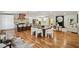 Spacious kitchen with large island, modern appliances, hardwood flooring, and open floor plan to living and dining areas at 2327 Doreen Ne Ct, Atlanta, GA 30345