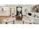 Inviting living room with fireplace, neutral decor, and views of the outdoors at 2327 Doreen Ne Ct, Atlanta, GA 30345