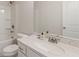 Bright bathroom with tub/shower, vanity with a sink, and toilet at 5103 Woodline View Ln, Auburn, GA 30011