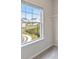 Bright bedroom featuring a view of the neighborhood landscape from a window at 5103 Woodline View Ln, Auburn, GA 30011