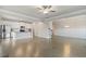 Open living space with modern kitchen, hardwood floors, and access to the dining room at 5103 Woodline View Ln, Auburn, GA 30011