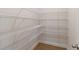 Walk-in pantry with wire shelving for optimal storage space and organization at 5103 Woodline View Ln, Auburn, GA 30011