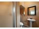 Compact and functional bathroom with a modern sink and shower stall at 96 Grover Way, Dallas, GA 30157