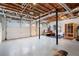 Spacious garage boasts epoxy floors, tall ceilings, insulated walls, and room for a home gym at 96 Grover Way, Dallas, GA 30157