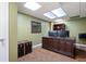 This office features an ornate wooden desk and built-in bookshelf for functional home workspace at 96 Grover Way, Dallas, GA 30157