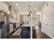 Bright kitchen with a center island, stainless appliances, and hardwood floors throughout at 1671 Hammock Dr, Smyrna, GA 30080