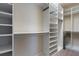 Spacious walk-in closet with built-in shelving providing ample storage at 1671 Hammock Dr, Smyrna, GA 30080