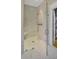 Contemporary bathroom with a glass-enclosed shower, tiled walls, and a built-in bench at 15 Northwood Ne Ave, Atlanta, GA 30309