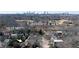 Aerial view of a tree filled neighborhood with landmarks Candler Park, Imman Park and the Atlanta Skyline at 1601 Marlbrook Ne Dr, Atlanta, GA 30307