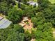 Aerial view of playground and tennis court amenities within a leafy community at 1601 Marlbrook Ne Dr, Atlanta, GA 30307