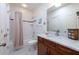 Bathroom featuring white subway tile, a dark wood vanity, and mosaic tile flooring at 1601 Marlbrook Ne Dr, Atlanta, GA 30307