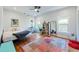 Spacious bedroom featuring hardwood floors, windows, and a comfortable bed at 1601 Marlbrook Ne Dr, Atlanta, GA 30307