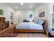 Bright bedroom features hardwood floors, natural light, and a view of the back yard at 1601 Marlbrook Ne Dr, Atlanta, GA 30307
