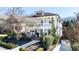 Two-story home with white exterior, covered porches, and mature landscaping at 1601 Marlbrook Ne Dr, Atlanta, GA 30307