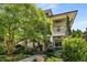Charming home exterior with a lush front yard, featuring a two-story porch and manicured landscaping at 1601 Marlbrook Ne Dr, Atlanta, GA 30307