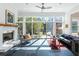 This sunny living room features a fireplace and an outdoor balcony at 1601 Marlbrook Ne Dr, Atlanta, GA 30307