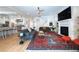 Open-concept living room with a fireplace and staircase at 1601 Marlbrook Ne Dr, Atlanta, GA 30307