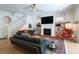 Inviting living room with a fireplace, open staircase, hardwood floors, and modern decor at 1601 Marlbrook Ne Dr, Atlanta, GA 30307