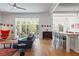 Open concept living space with clear sight lines to the kitchen with an island and seating at 1601 Marlbrook Ne Dr, Atlanta, GA 30307