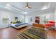 Spacious main bedroom with tray ceiling, hardwood floors, and large windows at 1601 Marlbrook Ne Dr, Atlanta, GA 30307