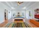 Large main bedroom with tray ceiling, hardwood floors, and ample natural light at 1601 Marlbrook Ne Dr, Atlanta, GA 30307