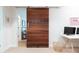 Home office featuring a modern desk and a unique wooden barn door at 1601 Marlbrook Ne Dr, Atlanta, GA 30307