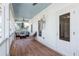 Inviting porch with a cozy seating area, ceiling fans, and stylish decor, perfect for relaxing outdoors at 1601 Marlbrook Ne Dr, Atlanta, GA 30307