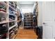 Spacious walk-in closet with custom shelving and ample storage for clothes, shoes, and accessories at 1601 Marlbrook Ne Dr, Atlanta, GA 30307