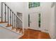 Foyer area with staircase and high ceilings at 535 Emerald Pkwy, Sugar Hill, GA 30518