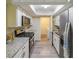 Updated kitchen featuring new stainless steel appliances, white cabinets, and granite countertops at 1206 Canyon Point Cir, Roswell, GA 30076