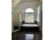 Bright bathroom featuring a soaking tub with a window and separate glass shower at 240 Flowers Cove Ln, Lilburn, GA 30047
